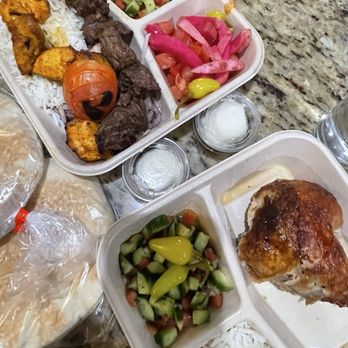Zankou Chicken - Combo Kabob Plate (top) & Quarter Dark Plate (bottom) with 2 garlic sauces & 2 packs of Pita Bread. - Mediterranean Near Me - Long Beach, California
