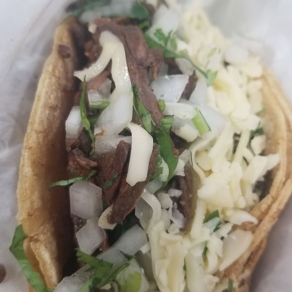L' Patron Tacos - Carne asada with cheese added - New Mexican Cuisine Near Me - Chicago, Illinois L' Patron Tacos - Carne asada with cheese added - New Mexican Cuisine Near Me - Chicago, Illinois