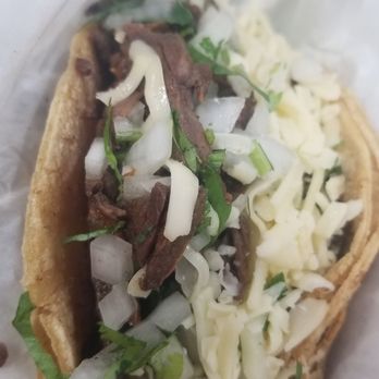 L' Patron Tacos - Carne asada with cheese added - New Mexican Cuisine Near Me - Chicago, Illinois L' Patron Tacos - Carne asada with cheese added - New Mexican Cuisine Near Me - Chicago, Illinois