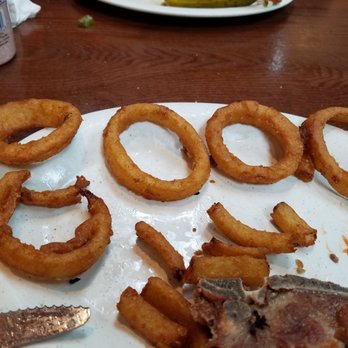 Sawmill Restaurant - Seventy five cents (.75) extra for 5 onion rigs, and some broken pieces. . - American Near Me - Wilmington, North Carolina