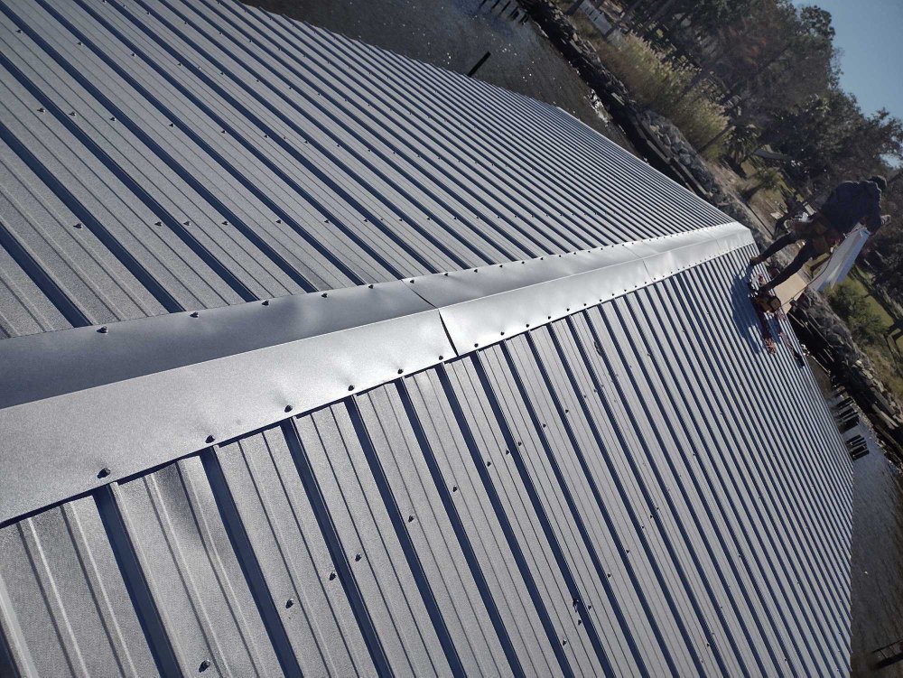 Slide of T-Roys Relief Roofing