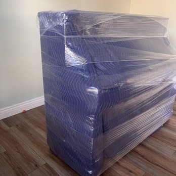 BigJExpress Moving & Logistics - Customer in O'Fallon, MO was pleased to see that their beautiful piano is 100% protected and blanket wrapped while in the moving pod. - Movers Near Me - O'Fallon, Missouri BigJExpress Moving & Logistics - Customer in O'Fallon, MO was pleased to see that their beautiful piano is 100% protected and blanket wrapped while in the moving pod. - Movers Near Me - O'Fallon, Missouri