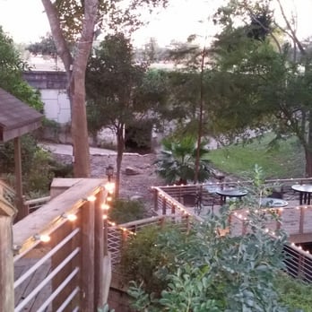 Rainbow Lodge - Outdoor seating and landscape - New American Near Me - Houston, Texas Rainbow Lodge - Outdoor seating and landscape - New American Near Me - Houston, Texas