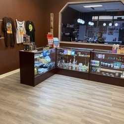 Native Brothers Dispensary On Santa Fe - CBD, headshop, and t-shirt sales area.