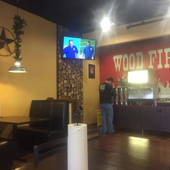 Cowboy Chicken - Interior of the restaurant is clean and comfortable football on the TV Sunday morning - American Near Me - McAllen, Texas