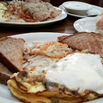 Norma's Cafe - Top:(#3)Fried steak with gravy,eggs,hashbrown and biscuits Bottom:Turkey omelette with hashbrowns and toast - Southern Near Me - Dallas, Texas