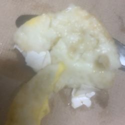 McDonald's - Round egg cooked with shells in it.