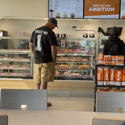Dunkin' - Looking at the delicious donuts.