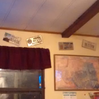 Constantino's - Licence plates are hung on walls everywhere in the restaurant - Pizza Near Me - Somerset, Texas