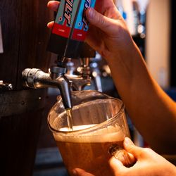 East Side Craft House - Jugs of craft beer