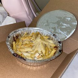 Domino's Pizza - Did they just give us the bottom of the pot? barely any pasta in here... 1 tiny piece of chicken.