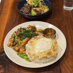 Kana Moo Krob over Rice (Crispy Pork Belly/Chinese Broccoli topped with Egg)
