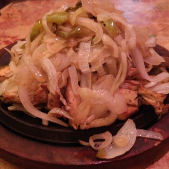 Tia Maria's - 2 person fajitas with a lot of onions. - Mexican Near Me - Houston, Texas Tia Maria's - 2 person fajitas with a lot of onions. - Mexican Near Me - Houston, Texas