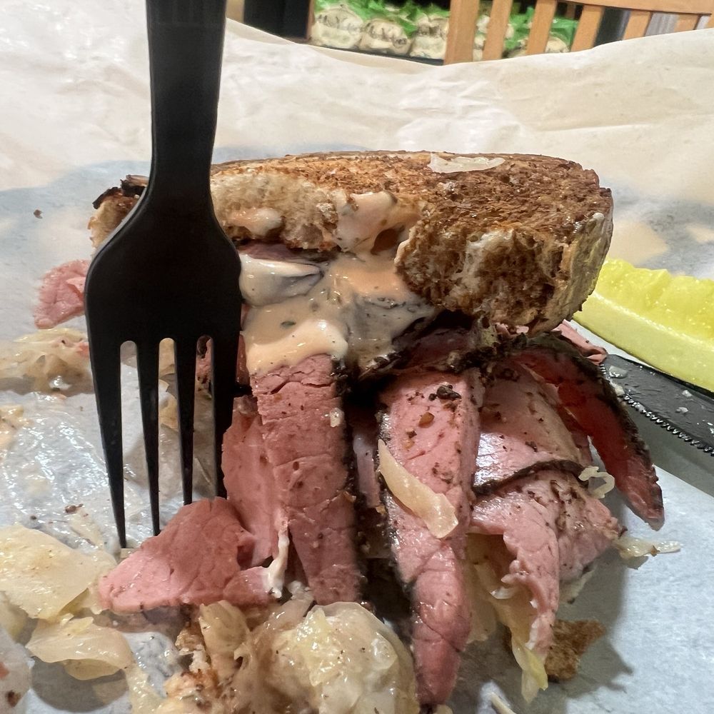 Rueben - you can see how thick the sandwich is to the fork and the thick slices of pastrami with marbled bread. Sooo good! Rueben - you can see how thick the sandwich is to the fork and the thick slices of pastrami with marbled bread. Sooo good!