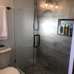 Turner's Custom Showers & Closets - Master bath fixed glass with swing door