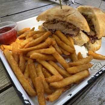 Camp Outpost - SLOW-ROASTED PORK sandwhich - New American Near Me - Springdale, Utah Camp Outpost - SLOW-ROASTED PORK sandwhich - New American Near Me - Springdale, Utah