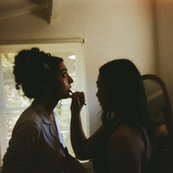 YEN by Katie - Katie doing my makeup on my wedding day