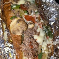 Parkside Variety - Steak Bomb . Ten percent steak . All veggies , soggy