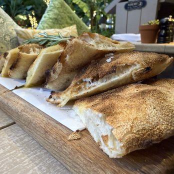 Gaby Cucina - Focaccia - Pizza dough, rosemary, coarse salt, extra virgin olive oil DOP - Italian Near Me - Aventura, Florida Gaby Cucina - Focaccia - Pizza dough, rosemary, coarse salt, extra virgin olive oil DOP - Italian Near Me - Aventura, Florida