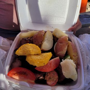 Manolo's Parrilla On Wheels - a container of food - Food Trucks Near Me - Katy, Texas