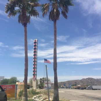 City of Baker - Picture perfect between two palm trees. - Local Flavor Near Me