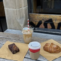 Espresso brownie, iced latte, black coffee & chai glazed cardamom bun @ original location Espresso brownie, iced latte, black coffee & chai glazed cardamom bun @ original location