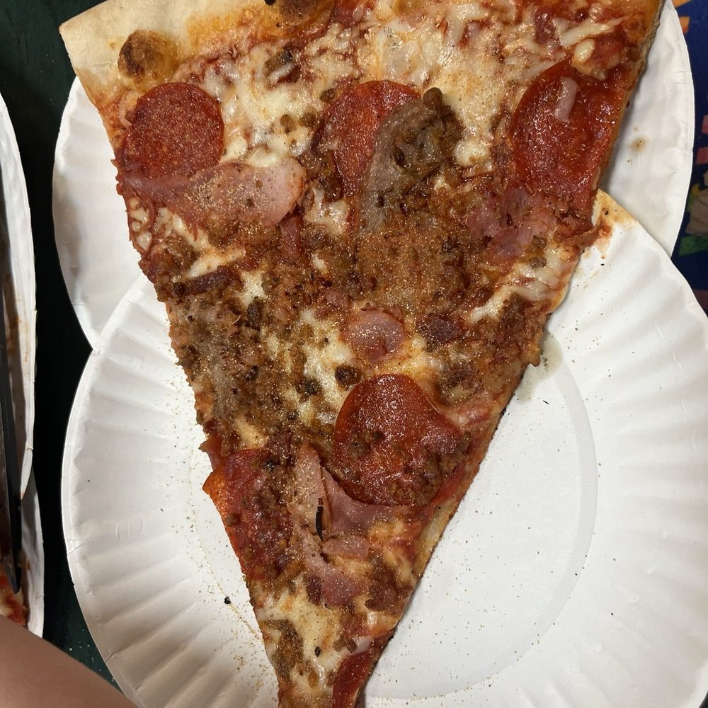 Humpavelli's Pizza - Meat lovers slice - Pizza Near Me - Titusville, Florida Humpavelli's Pizza - Meat lovers slice - Pizza Near Me - Titusville, Florida