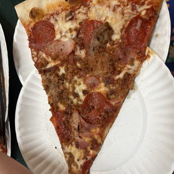 Humpavelli's Pizza - Meat lovers slice - Pizza Near Me - Titusville, Florida Humpavelli's Pizza - Meat lovers slice - Pizza Near Me - Titusville, Florida