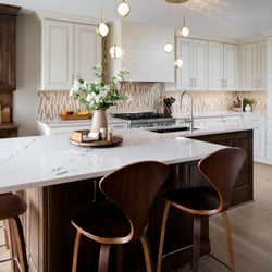 Karin Ross Designs - The cozy feel into a functional kitchen with a mix of elegance, hard to deliver but beautiful once delivered.