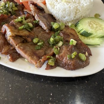 Pho An - Grilled boneless pork on a rice plate. - Vietnamese Near Me - Richardson, Texas Pho An - Grilled boneless pork on a rice plate. - Vietnamese Near Me - Richardson, Texas