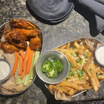 Topgolf - Bbq wings & cheese fries - New American Near Me - Orlando, Florida Topgolf - Bbq wings & cheese fries - New American Near Me - Orlando, Florida