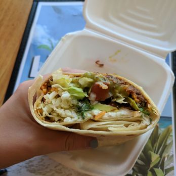 Las Rocas Postres - Barbacoa Burrito. Well, half.... - Mexican Near Me - Grand Rapids, Michigan