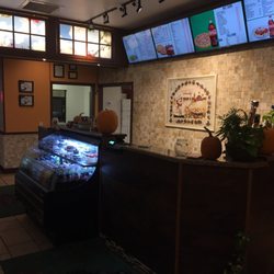 Front counter with menu boards.