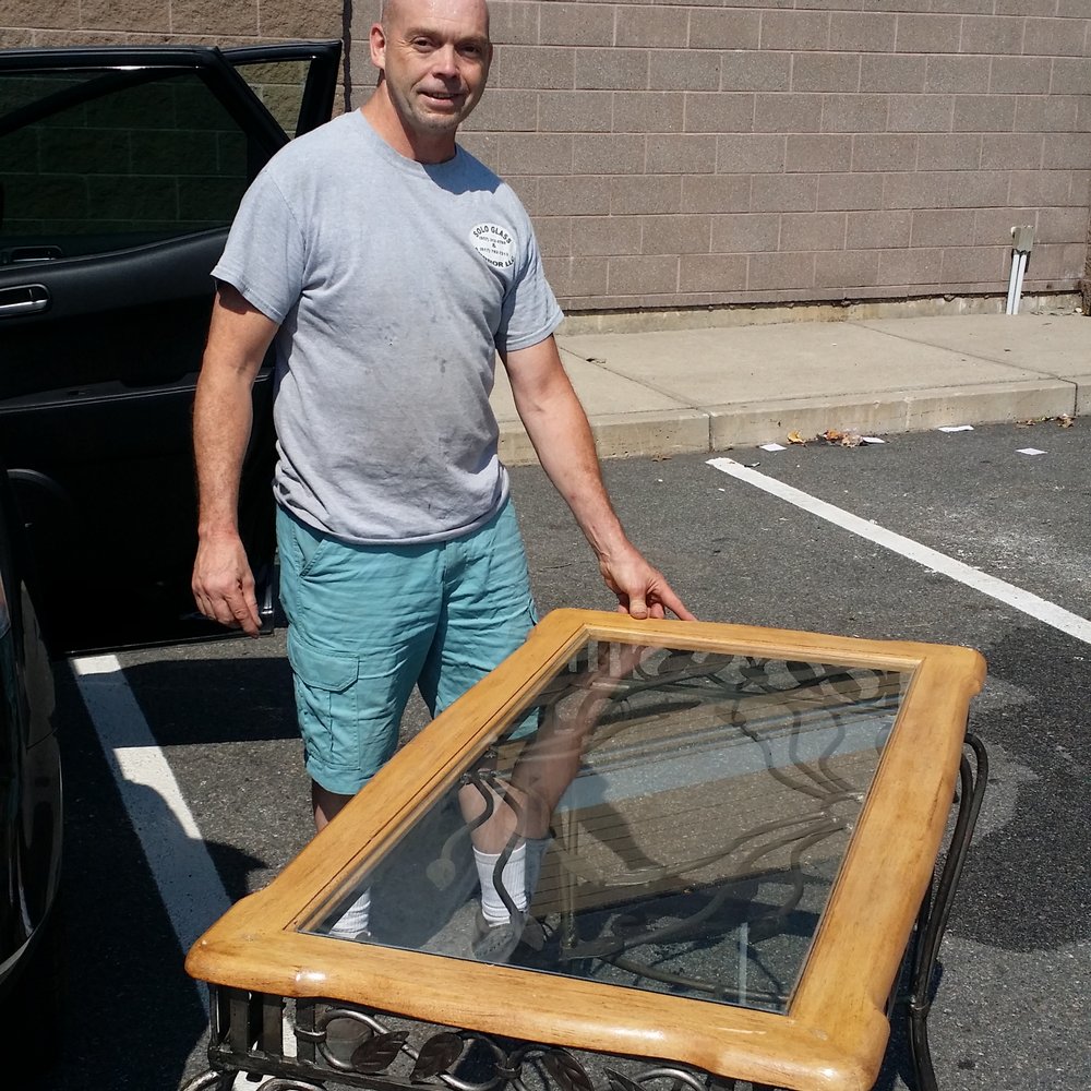 Timmy and our custom cut glass table top. THANKS TIMMY! Timmy and our custom cut glass table top. THANKS TIMMY!