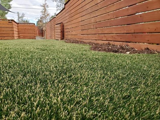 Home Landscape - At RockSolid Turf and Landscape, we recently completed a comprehensive landscaping renovation that transformed a client's outdoor space into a beautiful, functional haven. The project involved the installation of a durable, privacy-enhancing fence, providing both security and aesthetic appeal. We followed with the installation of high-quality, eco-friendly artificial grass, creating a lush, low-maintenance lawn that stays vibrant year-round. Our skilled team crafted a custom Flagstone patio to complete the transformation, blending natural stone elements with the landscape to create elegant outdoor living areas. This full-scale renovation not only added value to their home, enhanced the property’s visual appeal, but also provided practical, long-lasting outdoor solutions. Our team’s expertise ensured every detail was executed to perfection, creating a space the homeowners can enjoy for years to come. Home Landscape - At RockSolid Turf and Landscape, we recently completed a comprehensive landscaping renovation that transformed a client's outdoor space into a beautiful, functional haven. The project involved the installation of a durable, privacy-enhancing fence, providing both security and aesthetic appeal. We followed with the installation of high-quality, eco-friendly artificial grass, creating a lush, low-maintenance lawn that stays vibrant year-round. Our skilled team crafted a custom Flagstone patio to complete the transformation, blending natural stone elements with the landscape to create elegant outdoor living areas. This full-scale renovation not only added value to their home, enhanced the property’s visual appeal, but also provided practical, long-lasting outdoor solutions. Our team’s expertise ensured every detail was executed to perfection, creating a space the homeowners can enjoy for years to come.