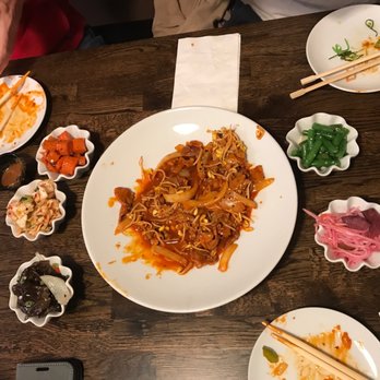 Woori - a plate of food on a table with chopsticks - Korean Near Me - Arlington, Massachusetts Woori - a plate of food on a table with chopsticks - Korean Near Me - Arlington, Massachusetts