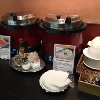 Club International - a selection of food items on a table - Airport Lounges Near Me - Seattle, Washington Club International - a selection of food items on a table - Airport Lounges Near Me - Seattle, Washington