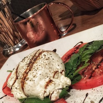 Prego Restaurant - Heirloom tomatoes with burrata and balsamic reduction. - Italian Near Me - Tustin, California Prego Restaurant - Heirloom tomatoes with burrata and balsamic reduction. - Italian Near Me - Tustin, California