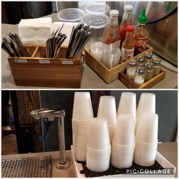 Copa Vida - Assorted condiments, napkins and utensils. Self-served water station located in the dining room behind the barista station. - New American Near Me - Pasadena, California