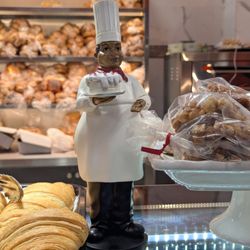 Flatlands Bakery - Cute baker statue on the counter.
