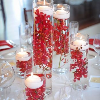Silver Leaf Flowers - cylinder vases with candles and orchids submerge in water for upcoming fall season you can pre- order at Naplessilverleaf.com - Florists Near Me - Naples, Florida Silver Leaf Flowers - cylinder vases with candles and orchids submerge in water for upcoming fall season you can pre- order at Naplessilverleaf.com - Florists Near Me - Naples, Florida