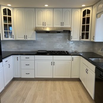 Ray's Straight Line Painting - AFTER - newly painted cabinets, updated backsplash and flooring - Painters Near Me Ray's Straight Line Painting - AFTER - newly painted cabinets, updated backsplash and flooring - Painters Near Me