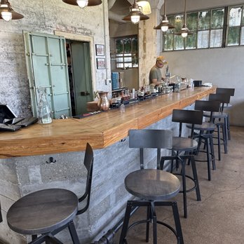 Balcones Distilling - Don working at the bar. - Distilleries Near Me - Waco, Texas