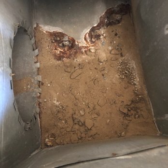 Scully's Air - Found under prior furnace, which wasn't very old. All this dust was blowing into our home  they sealed it up with new sheet metal! - Heating & Air Conditioning/HVAC Near Me