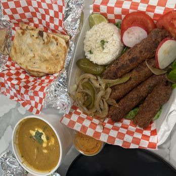 Sizzlin’ Masala - Butter chicken, lamb seekh kebab, garlic naan - Indian Near Me - Modesto, California Sizzlin’ Masala - Butter chicken, lamb seekh kebab, garlic naan - Indian Near Me - Modesto, California