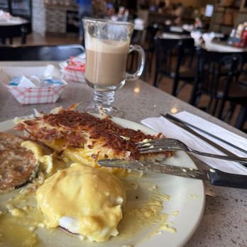 Luka Restaurant - Egg Benedict with hashbrowns, and a cappuccino. - Latin American Near Me - Plantation, Florida Luka Restaurant - Egg Benedict with hashbrowns, and a cappuccino. - Latin American Near Me - Plantation, Florida