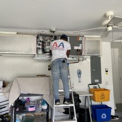 AA American Air Conditioning - Handler being installed.