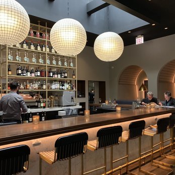 Ella Elli - Bar area with booths in the back - Wine Bars Near Me - Chicago, Illinois