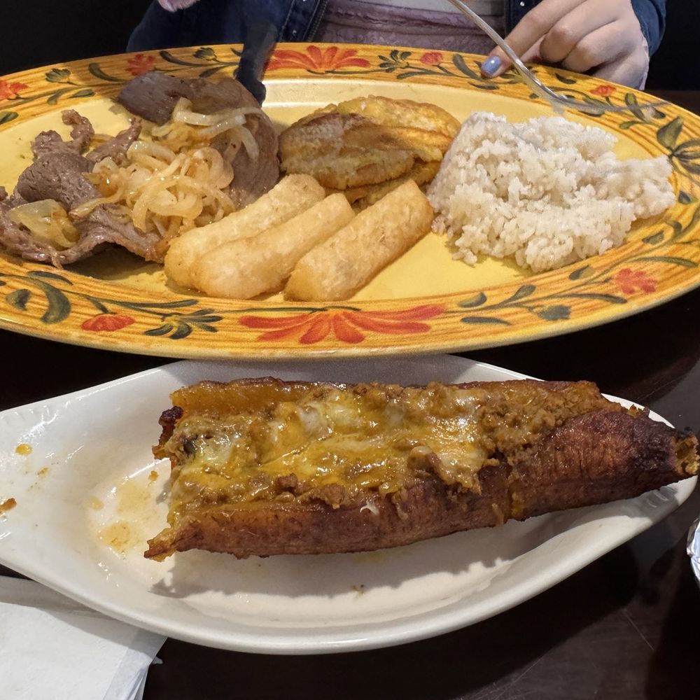 Latin Quarters - Canoa and Steak with onions, rice, yuca Frits and tostones - Puerto Rican Near Me - Sarasota, Florida