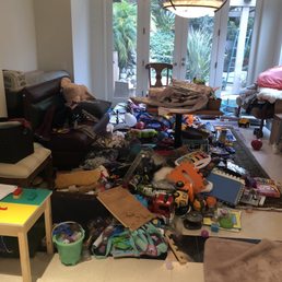 Broken heaps of Children's toys are and dining room decor dumped in huge ruined piles Broken heaps of Children's toys are and dining room decor dumped in huge ruined piles
